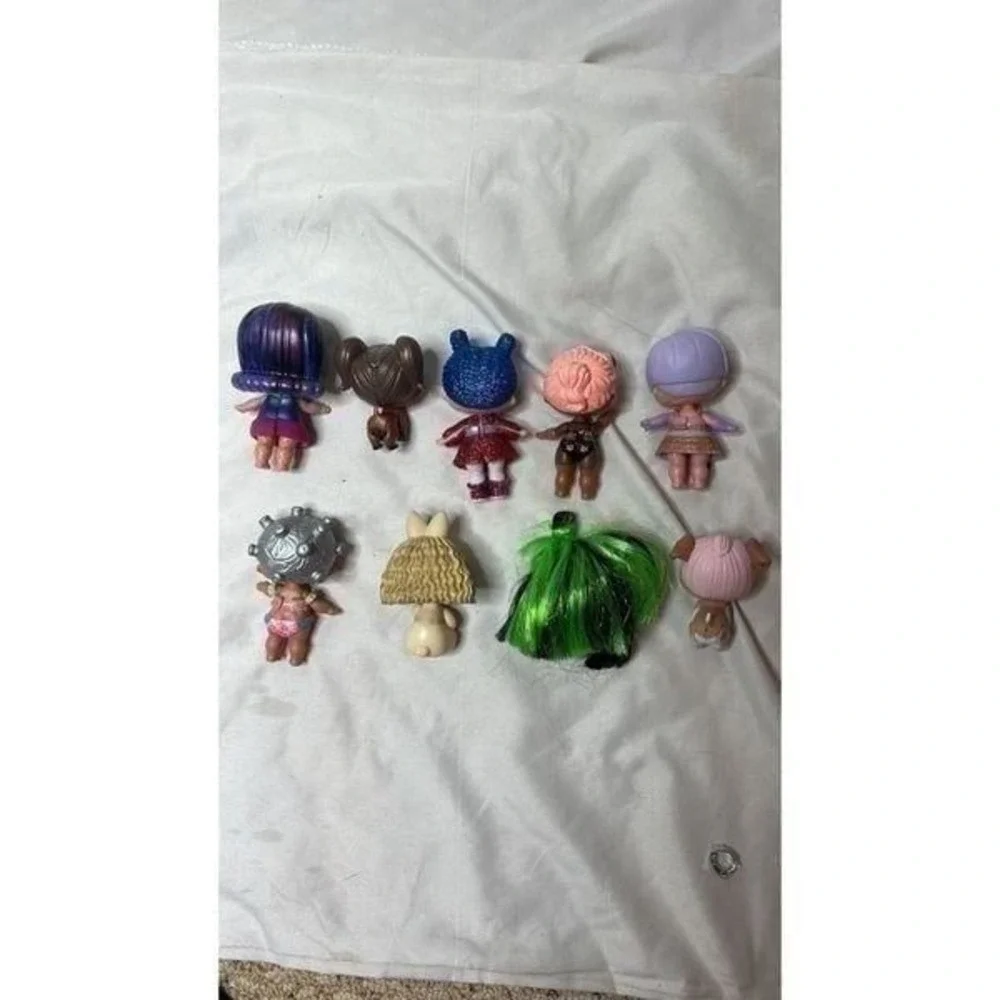Set Of Nine LOL Surprise Dolls.